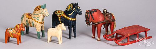 Three Scandinavian carved dala horses, etc.