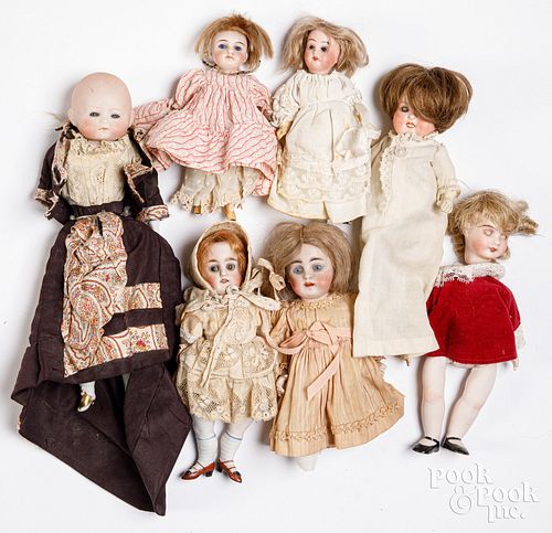 Seven small bisque dolls, 19th c.