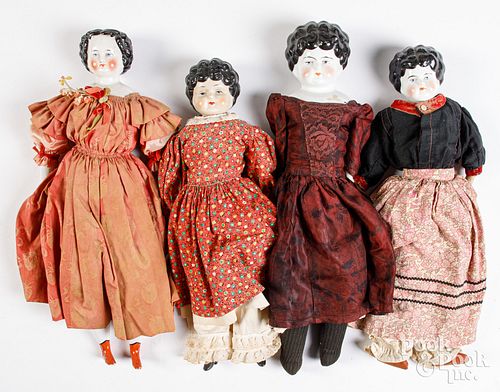 Four bisque head and shoulder dolls