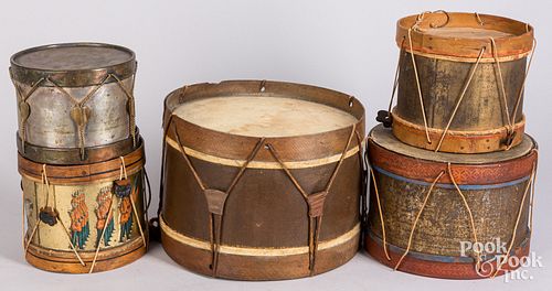 Five tin toy drums, 20th c.
