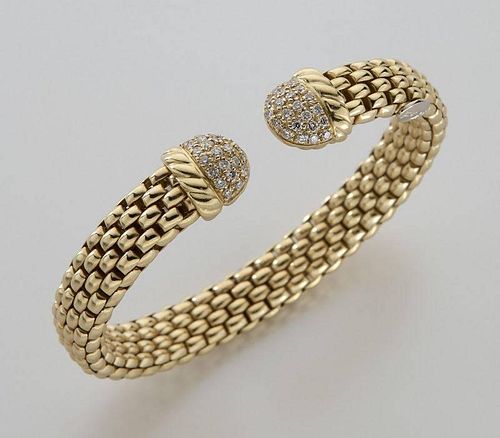 Italian 18K gold and diamond bangle bracelet.