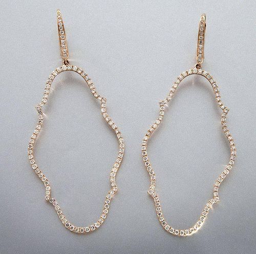 18K rose gold and diamond earrings.