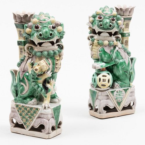 Pair of Chinese Glazed Porcelain Buddhistic Lion Candleholders
