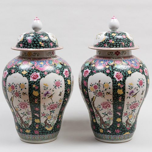 Pair of Chinese Famille Rose and Black Ground Porcelain Baluster Jars and Covers