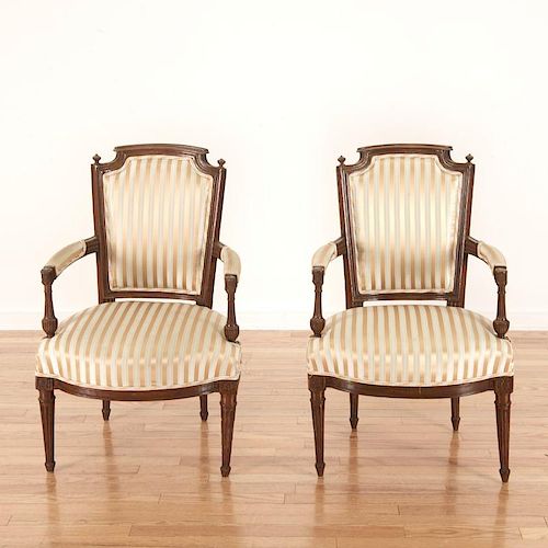 Pr Directoire silk upholstered mahogany fauteuils