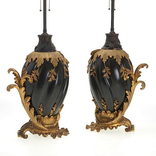 Pr Continental Rococo gilt, ebonized bronze lamps