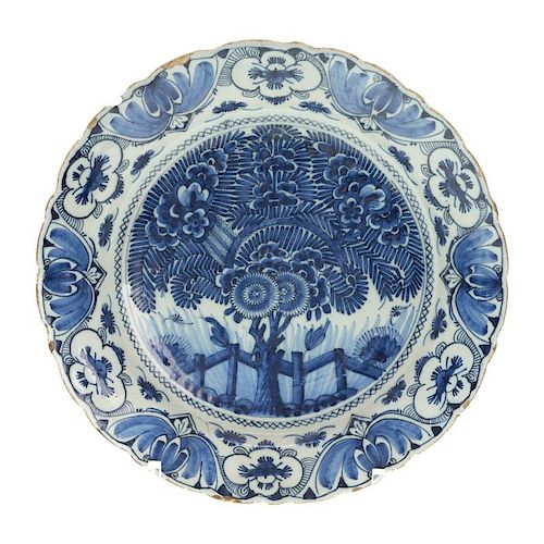 Delft blue and white pottery charger, signed
