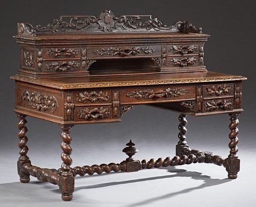 Henri II Style Carved Oak Desk, 19th c., with a pi