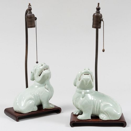 Pair of Chinese Celadon Glazed Porcelain Mythical Beasts Mounted as Lamps
