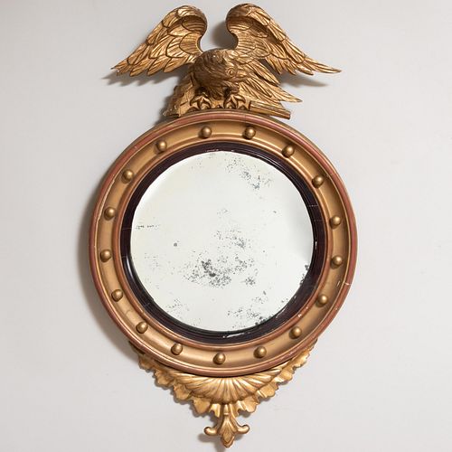 Regency Style Carved Giltwood and Ebonized Convex Mirror