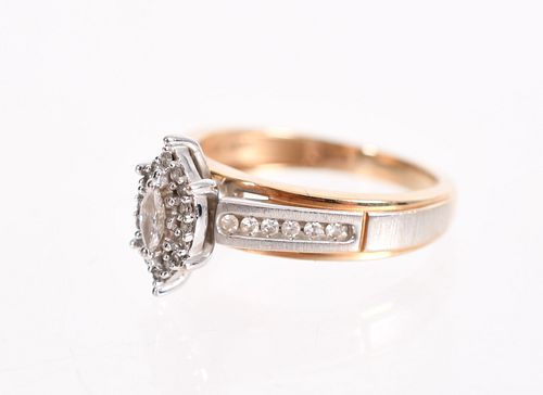 A 14k Gold and Diamond Ring