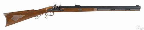 Thompson Center flintlock rifle, .50 caliber, with set triggers, a brass patch box