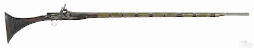North African Miquelet lock musket, approximately .65 caliber, with a brass banded stock