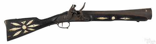 North African or Middle Eastern flintlock blunderbuss with an ornately etched iron barrel