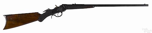 Hopkins and Allen falling block single shot takedown rifle, .22 caliber, with a tang peep sight