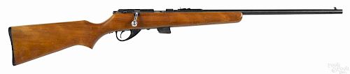 Two bolt action rifles, to include a Remington Model 511 Scoremaster clip fed rifle, .22 caliber