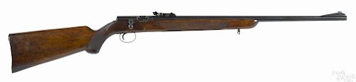 Mauser Werke bolt action single shot rifle, .22 caliber, with a checkered walnut pistol grip stock