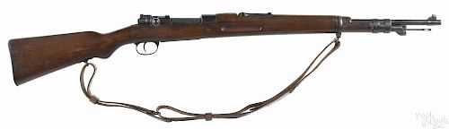 Spanish model 1943 Mauser bolt action short rifle, 8 mm, with a 24'' round barrel. Serial #U1824.