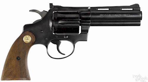Colt Diamondback six-shot revolver, .22 rimfire caliber, with a 4'' barrel. Serial #S84155.