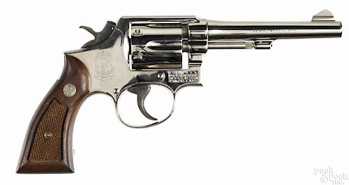 Smith & Wesson model 10-5 six-shot nickel-plated revolver, .38 special caliber, with a 5'' barrel.