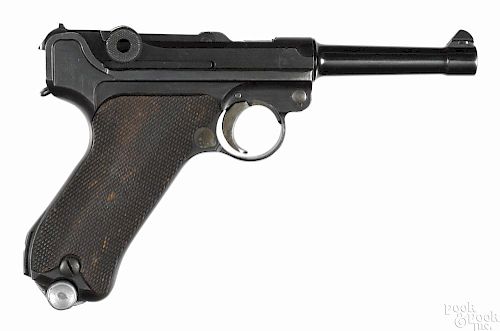 S-42 P-08 German Luger semi-automatic pistol, 9 mm, with no chamber date and 4'' round barrel.