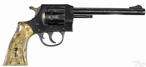 H & R Sidekick model 929 nine-shot revolver, .22 caliber, with tan plastic grips