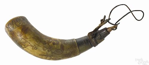 American carved powder horn, ca. 1800, with folk decoration of animals, hearts, and people