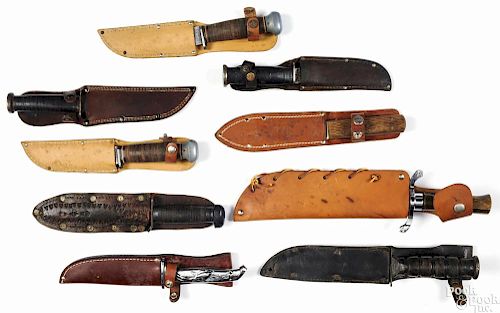 Nine sheath knives, to include two USN Mark I, a Western, a J. Russel, a K-BAR, a US Conetta