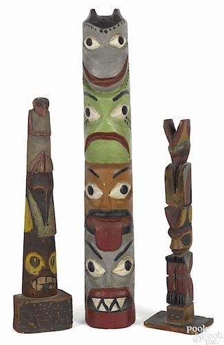 Three Northwest Coast carved and painted totem poles, early/mid 20th c., tallest - 14''.