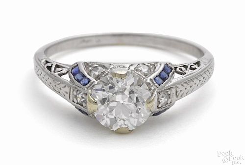14K white gold, diamond, and sapphire ring, with a filigree setting