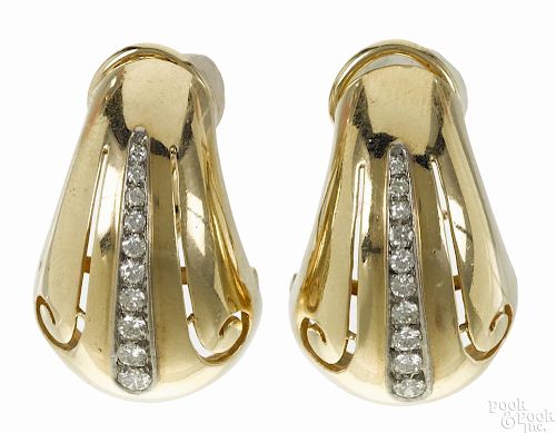 14K yellow gold and diamond earrings, each set with a line of ten diamonds, .50ct, 7.7 dwt.