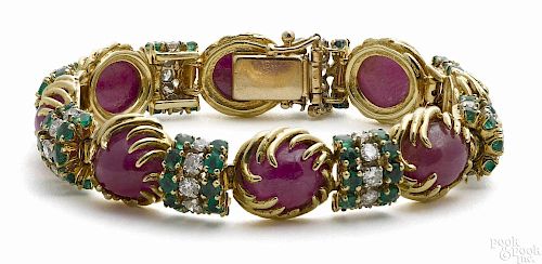 18K yellow gold, ruby, diamond, and emerald bracelet with eight ruby cabochons