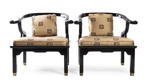 * Manner of James Mont, SECOND HALF 20TH CENTURY, a pair of yoke back armchairs with brass mounts