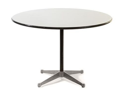 * Charles and Ray Eames (American, 1907-1978; 1912-1988), HERMAN MILLER, CIRCA 1970s, a circular dining table