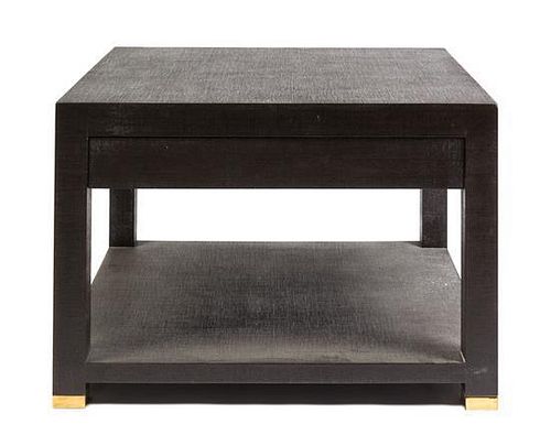 Attributed to Karl Springer (German, 1931-1991), CIRCA 1970s, a modern brown lacquered and brass mounted low table