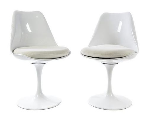 * Style of Eero Saarinen (Finnish, 1910-1961), LATE 20TH CENTURY, a pair of Tulip chairs