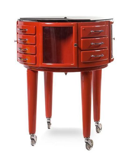 * A Modern Enameled Metal Circular Dentil Cabinet, MID 20TH CENTURY, a black glass top over stacking drawers flanked by glaze
