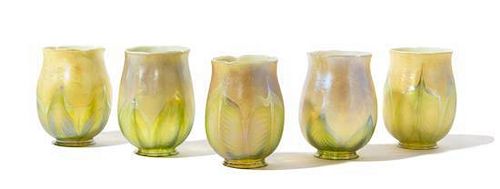 Tiffany Studios, a set of five bell form shades with pulled feather decoration