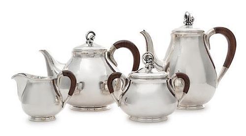 A Silver Four-Piece Tea and Coffee Service, Holger Rasmussen, Copenhagen, Denmark, comprising a tea pot, coffee pot, creamer 