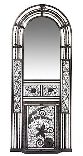 An Art Deco Wrought Iron Hall Tree, FRANCE, EARLY 20TH CENTURY, of arched form, worked to show scrolls and floral blossoms