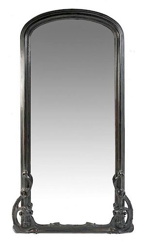 An Art Nouveau Ebonized Wood Hall Mirror Height 82 1/2 x width 46 inches