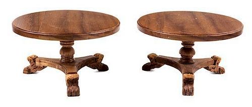 A Pair of Renaissance Revival Style Dining Tables Height 2 3/8 x diameter 4 inches.