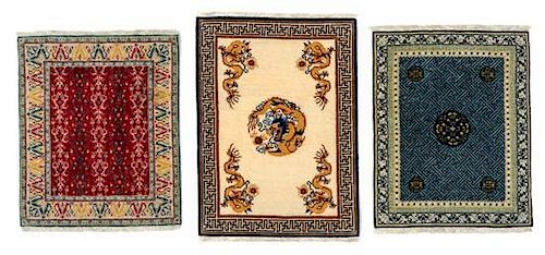 Three Wool Needlepoint Rugs Largest 11 1/8 x 8 1/8 inches.
