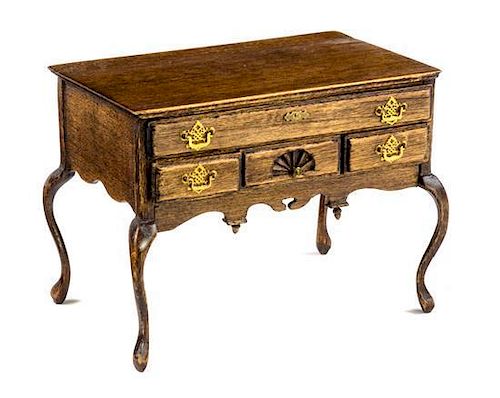 A Queen Anne Style Lowboy Height 2 3/8 x width 3 1/4 x depth 2 1/8 inches.