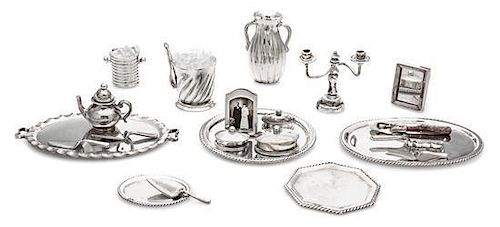 A Collection of Silver Table Articles, Enrique Quintanar, comprising five serving trays, three table caskets, a lobed water p