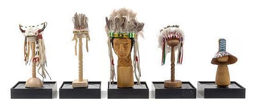 Five Native American Style Headdresses Length of longest 3 1/4 inches.