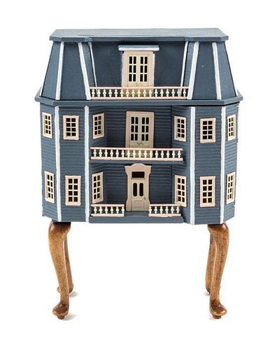 A Miniature Doll's House Height 4 1/2 x width 3 1/8 x depth 1 1/2 inches.