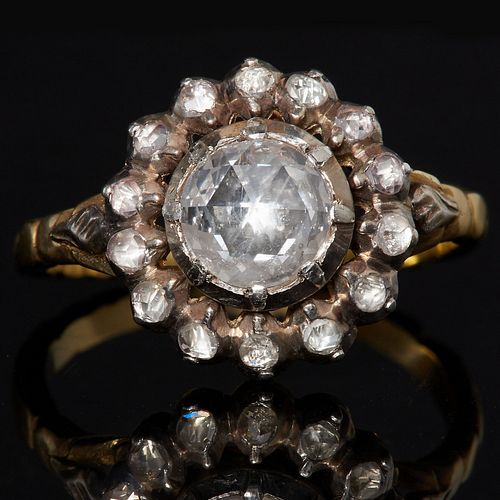 ANTIQUE DIAMOND CLUSTER RING, set with a central rose cut diamond of approx 0.82 ct. surrounded by 14 rose cut diamonds. Shank with scrolling design. 