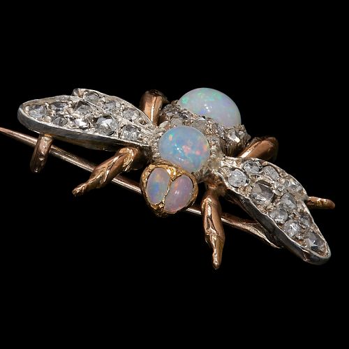 DIAMOND AND OPAL WINGED INSECT BROOCH. set with vibrant opals on the body,head and the eyes. with rose cut diamonds on the wings and the body. L 2 cm.