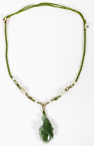 GREEN JADE FLORAL PENDANT ON WOVEN FABRIC NECKLACE
